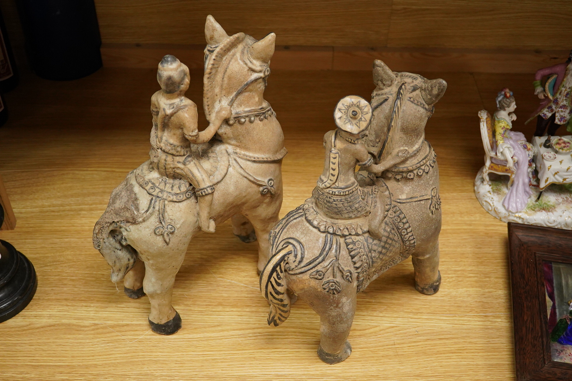 Two large Thai crackle glaze figures on horseback, 39cm high